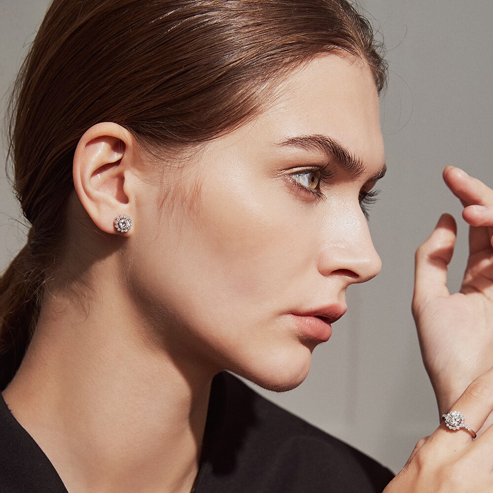 Moissanite Flower Halo Stud Earrings (2) Moissanite Flower Halo Stud Earrings modelled