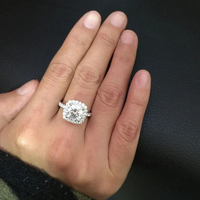 Carita 4ct Round Moissanite Cushion Halo Ring with Half Pave Band (3) Carita 4ct Round Moissanite Cushion Halo Ring with Half Pave Band