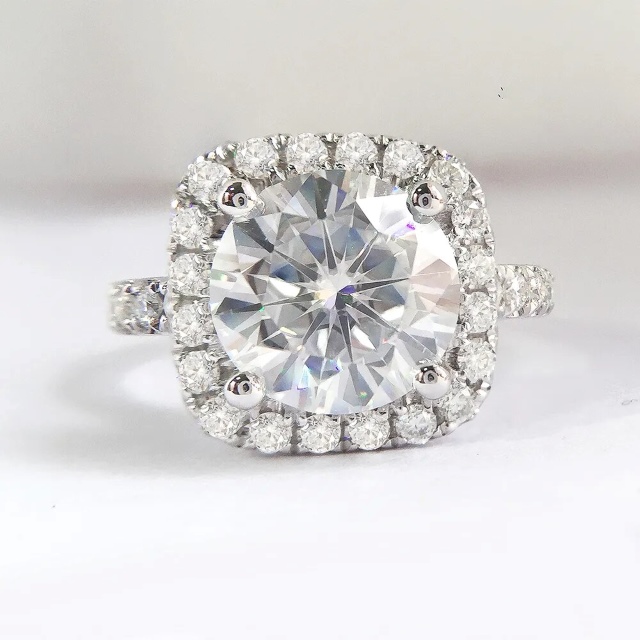 Carita Round Moissanite Cushion Halo Ring with Half Pave Band (1) Carita Round Moissanite Cushion Halo Ring with Half Pave Band