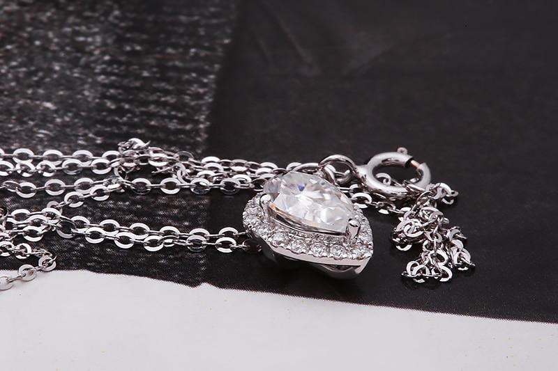 1ct Pear Halo Pendant side flat lay 1ct Pear Halo Pendant