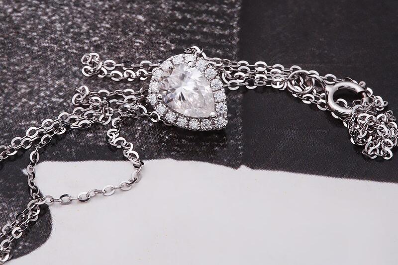 1ct Pear Halo Pendant front flat lay 1ct Pear Halo Pendant