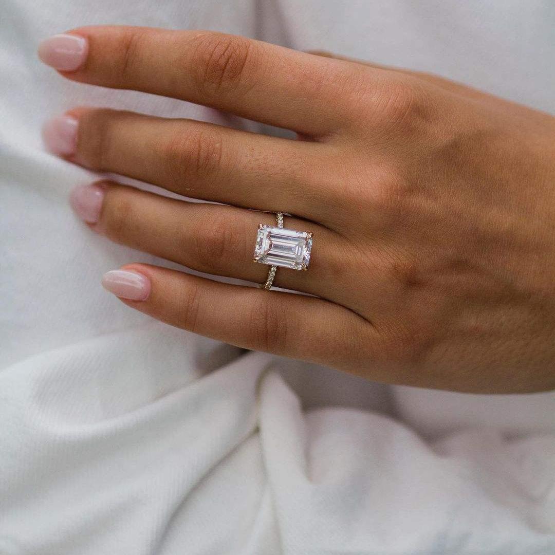 7 Carat Emerald Cut Solitaire Moissanite Ring with Half Pave Band 7 Carat Emerald Cut Solitaire Moissanite Ring with Half Pave Band