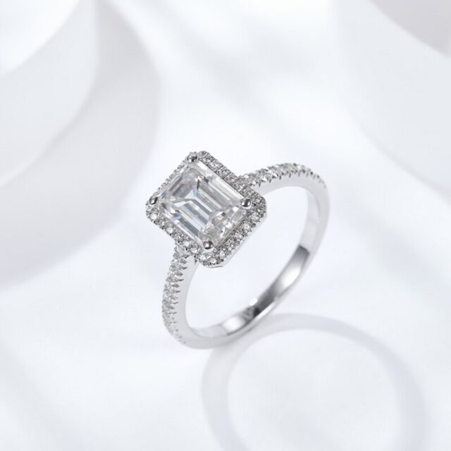 Emery SS Moissanite Emerald Cut Halo Ring (1) Moissanite Emerald Cut Halo Ring
