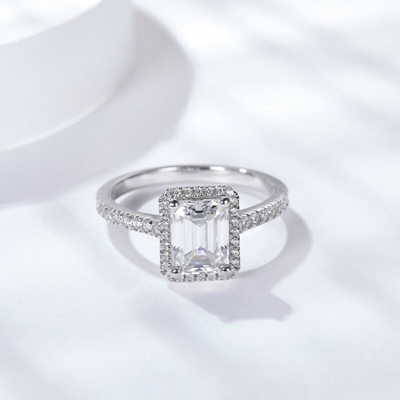 Emery SS Moissanite Emerald Cut Halo Ring (4) Moissanite Emerald Cut Halo Ring