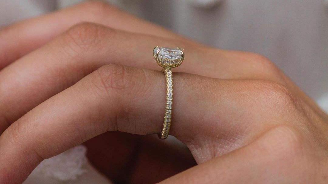 Cushion Cut Crushed Ice Moissanite Hidden Halo Ring YG Side Profile