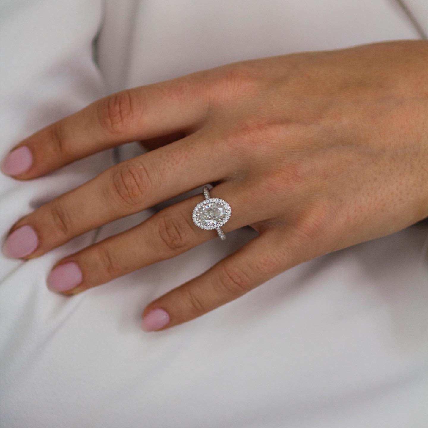 4.5 Carat Hybrid Oval Cut Moissanite Halo Ring 4.5 Carat Hybrid Oval Cut Moissanite Halo Ring