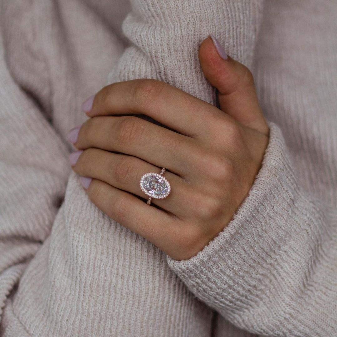 4.5 Carat Hybrid Oval Cut Moissanite Halo Ring 4.5 Carat Hybrid Oval Cut Moissanite Halo Ring