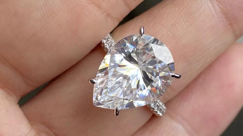 10ct Pear Moissanite Solitaire Ring with Pave Band (4) Pear Moissanite Solitaire Ring