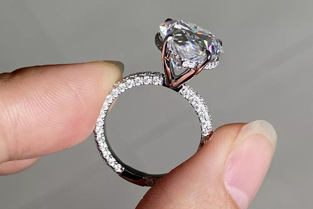 10ct Pear Moissanite Solitaire Ring with Pave Band (5) Pear Moissanite Solitaire Ring