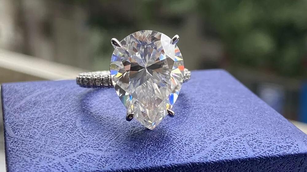 10ct Pear Moissanite Solitaire Ring with Pave Band (3) Pear Moissanite Solitaire Ring