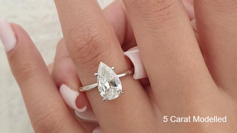 5ct Pear Moissanite Solitaire Ring modelled