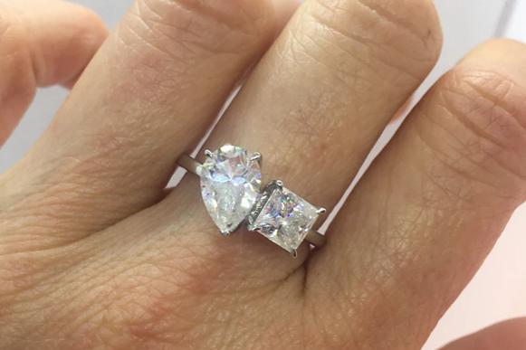 Pear Princess Toi Et Moi Moissanite Ring (Modelled).jpg Pear Princess Toi Et Moi Moissanite Ring (Modelled)