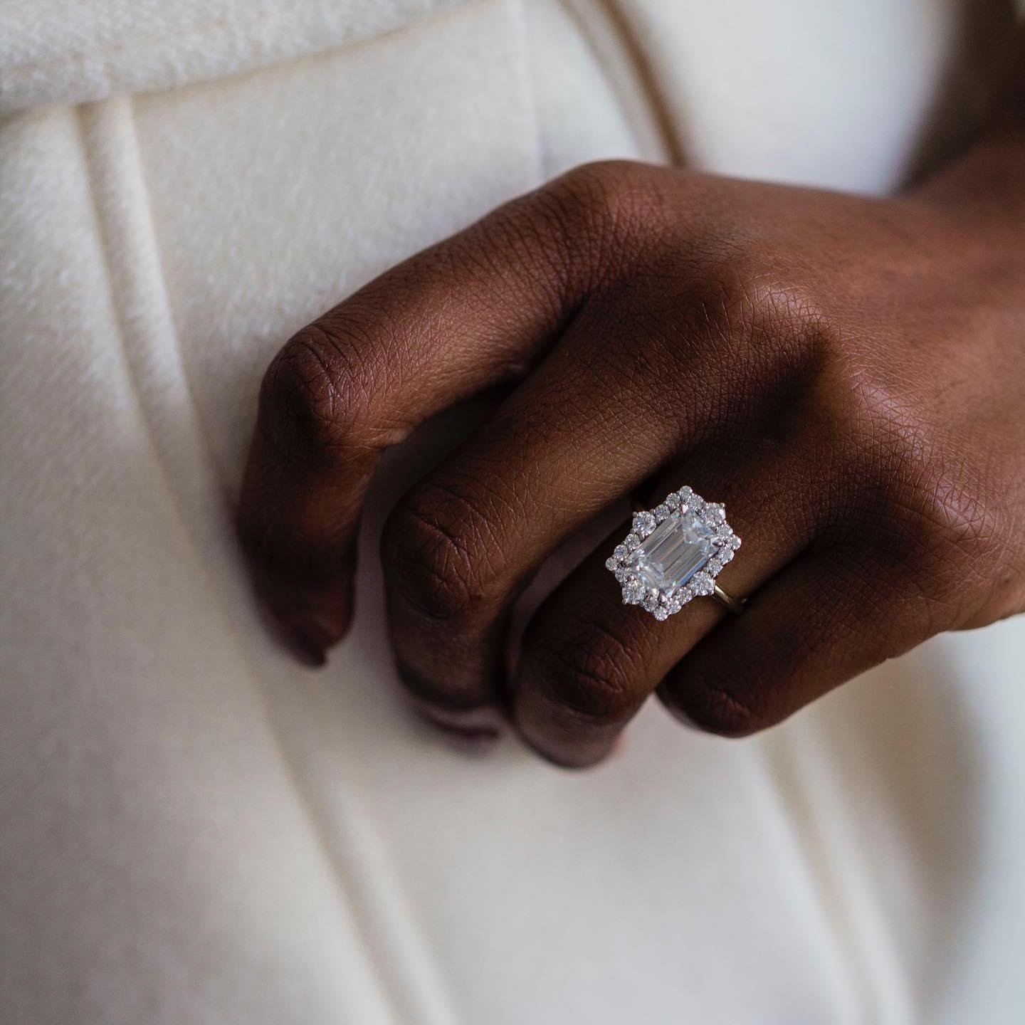 ‘Emiko’ 3.55 Carat Emerald Cut Moissanite Art Deco Halo Ring 'Emiko' 3.55 Carat Emerald Cut Moissanite Art Deco Halo Ring