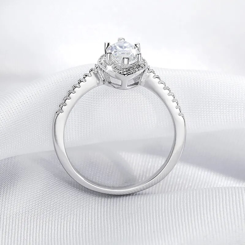 Marnesha Moissanite Marquise Halo Ring with Half Pave Band (2) Marnesha Moissanite Marquise Halo Ring with Half Pave Band