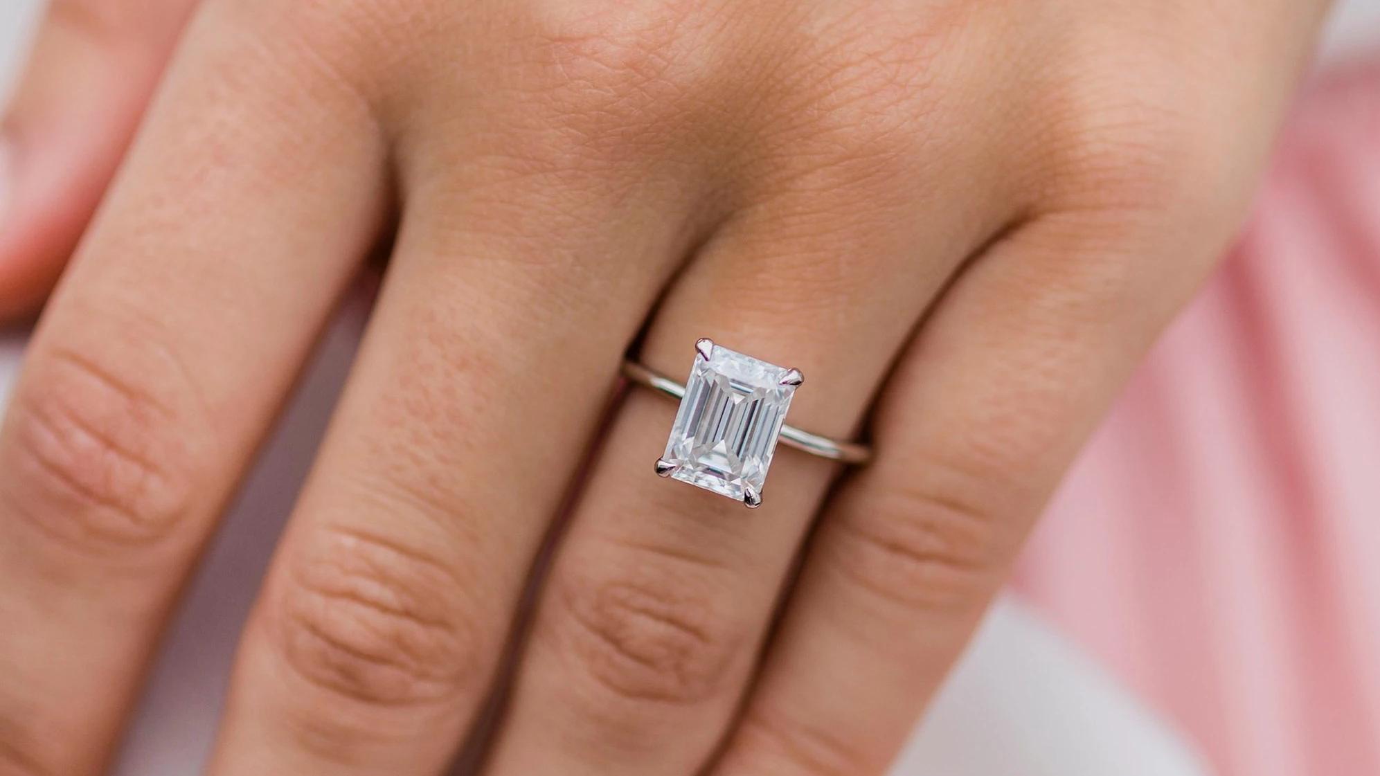 3ct Emerald Cut Moissanite Solitaire Ring modelled (WG).jpg 3ct Emerald Cut Moissanite Solitaire Ring modelled (WG)