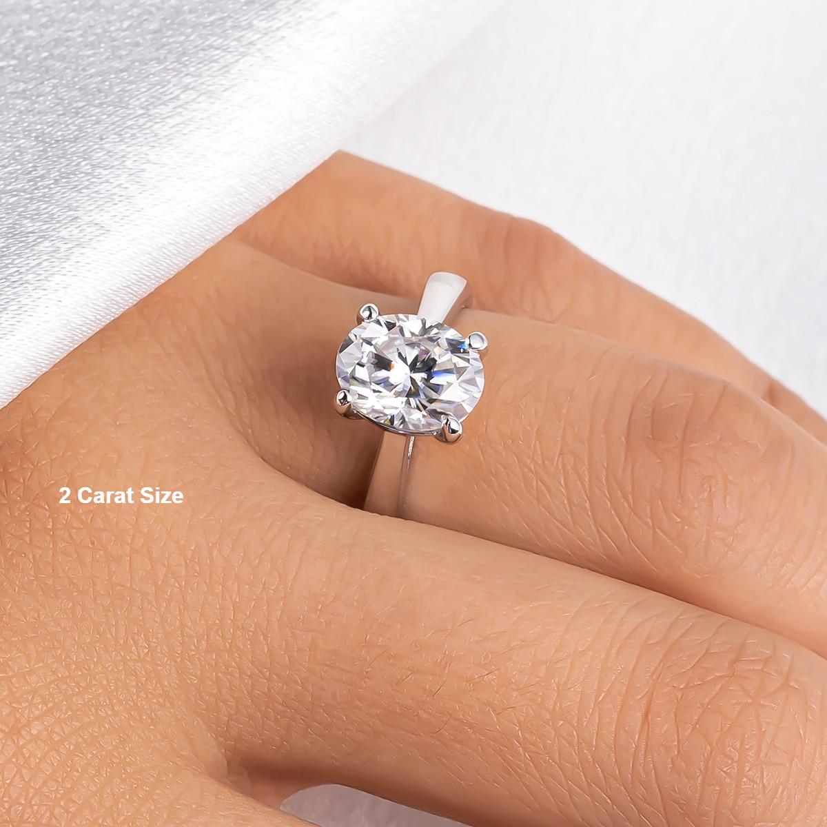 2ct Oval Cut Moissanite Solitaire Ring Modelled 2ct Oval Cut Moissanite Solitaire Ring Modelled