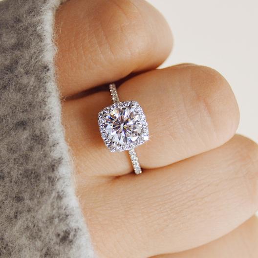 ‘Carita’ 0.5 Carat to 3 Carat Round Moissanite Cushion Halo Ring 'Carita' 0.5 Carat to 3 Carat Round Moissanite Cushion Halo Ring
