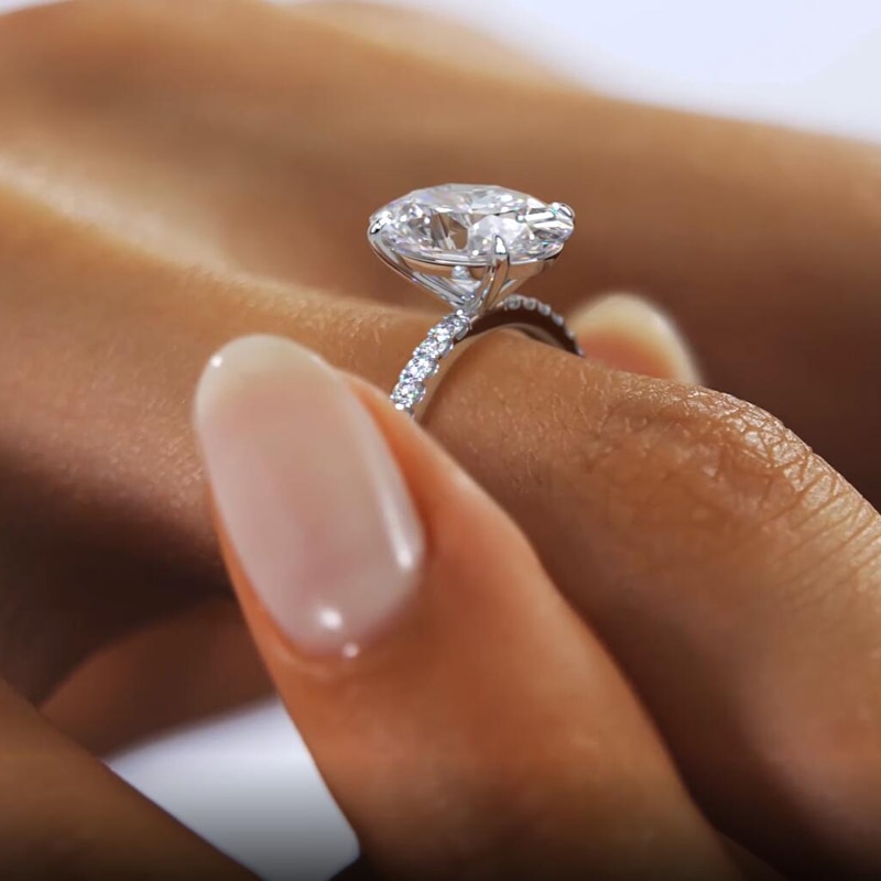 Oprah Oval Cut Moissanite 4 Prong Ring with Half Pave Band (1) oval cut moissanite 4 prong ring