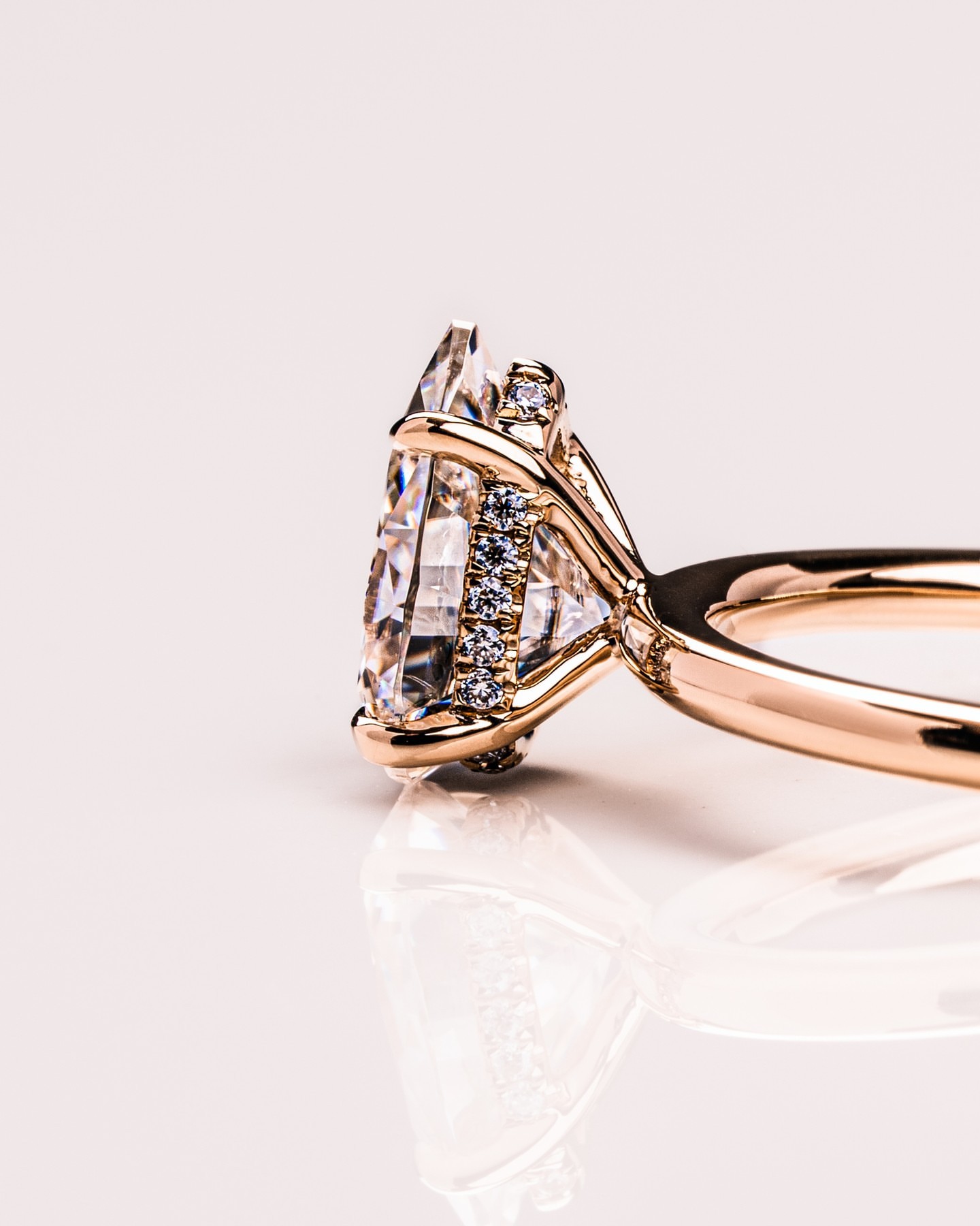 1.5ct Pear Hidden Halo Moissanite 4 Prong Ring (3) 1.5ct Pear Hidden Halo Moissanite 4 Prong Ring