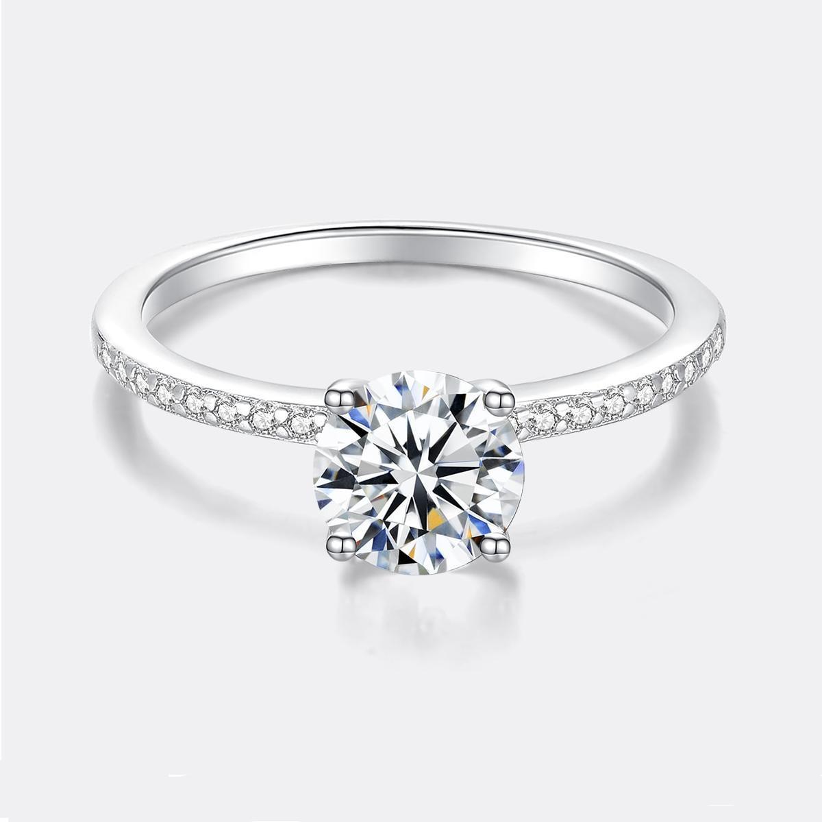 'Soleil' 1 or 2 Carat Round Genuine Moissanite 4 Prong Basket Setting Solitaire Ring 'Soleil' 1 or 2 Carat Round Genuine Moissanite 4 Prong Basket Setting Solitaire Ring