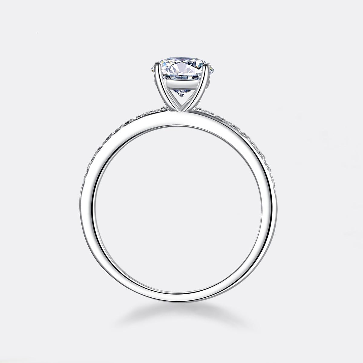 'Soleil' 1 or 2 Carat Round Genuine Moissanite 4 Prong Basket Setting Solitaire Ring 'Soleil' 1 or 2 Carat Round Genuine Moissanite 4 Prong Basket Setting Solitaire Ring