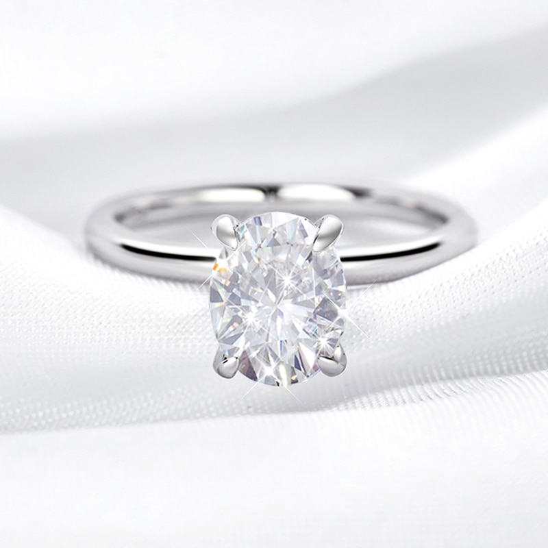 oval moissanite 4 Prong ring with  hidden halo 