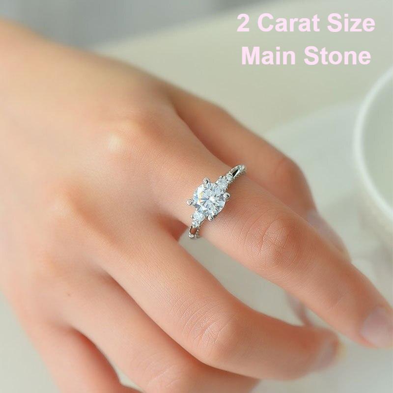 Cynthia 2ct Round Moissanite Trilogy Crossover Ring (1)