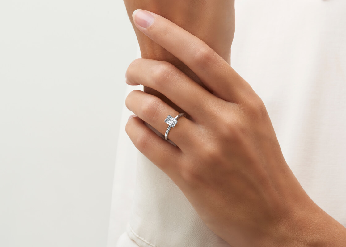Elise 1ct Emerald Radiant Cut Moissanite Solitaire Ring Modelled